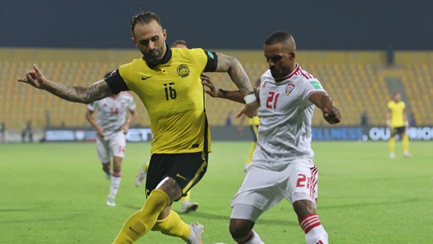 Malaysia (áo vàng) thảm bại trước UAE. (Nguồn: AFC)