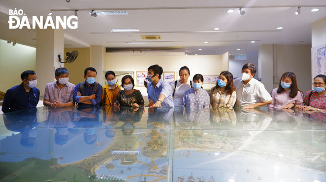 Developing highly-qualified  human resources for culture is a must-do for the sake of with tourism development. Visitors are seen at the Museum of Da Nang in February, 2021. Photo: NGOC HA