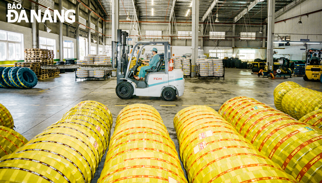 Production activities are observed at the Da Nang Rubber Joint Stock Company. Photo: LE HUNG HUNG