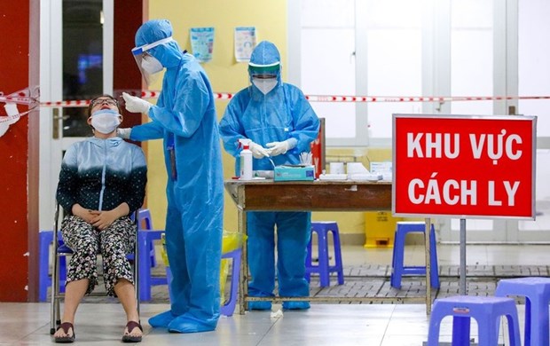 A woman has sample taken for COVID-19 testing in Binh Tan district of HCM City (Photo: VNA)