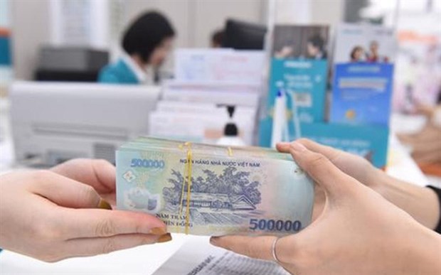 30 business fees and charges worth around 1 trillion VND (43 million USD) will be reduced to support businesses and individuals. (Photo chinhphu.vn)