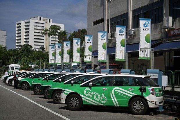 Ride-hailing firm Grab will trial hybrid car service (Photo: Straits Times)