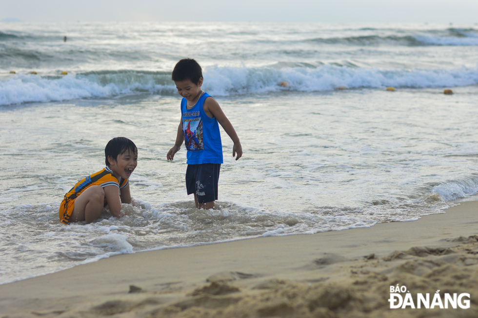  Children enjoy relaxing time on beaches.