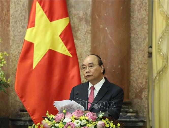 Chủ tịch nước Nguyễn Xuân Phúc phát biểu tại buổi trao quyết định. Ảnh: Thống Nhất/TTXVN