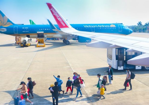 Tho Xuan Airport in Thanh Hoa province. Vietnam Airlines and Vietjet Air have deployed the IATA Travel Pass, an electronic health passport application. (Photo: VNA)