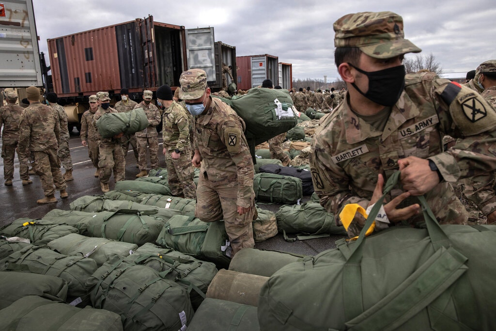 Các binh sĩ Mỹ này được trở về nhà vào năm ngoái sau 9 tháng đồn trú ở Afghanistan. 						               Ảnh: Getty Images
