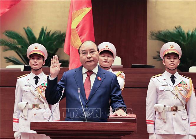 Chủ tịch nước Nguyễn Xuân Phúc tuyên thệ nhậm chức trước Quốc hội, đồng bào và cử tri cả nước. Ảnh: Thống Nhất/TTXVN