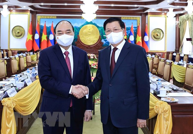 Chủ tịch nước Nguyễn Xuân Phúc và Tổng Bí thư, Chủ tịch nước Lào Thongloun Sisoulith tại buổi hội đàm. (Ảnh: Thống Nhất/TTXVN)