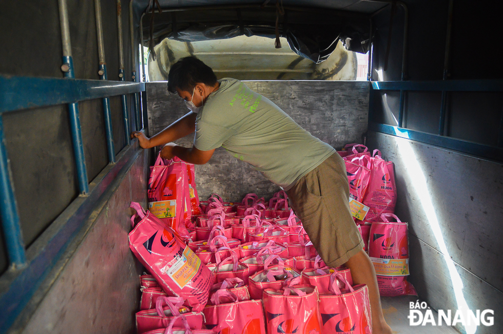 Each gift bag contains rice, cooking oil, dried fish and other essential food.