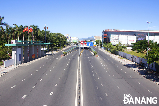 Dien Bien Phu street tunnel was eerily quiet after 8am on Monday. Photo: XUAN DUNG