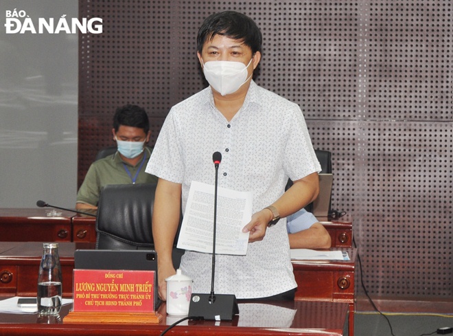 Mr Luong Nguyen Minh Triet, the Deputy Secretary of the municipal Party Committee and Chairman of the municipal Peoples Council  delivers his address at Mondays meeting. Photo: LE HUNG