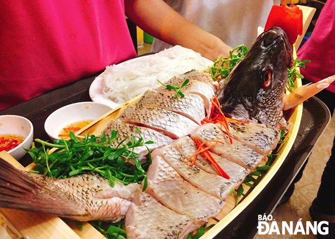 A fresh sashimi made from fish caught by Muoi Rau’s owner. Photo: H.L
