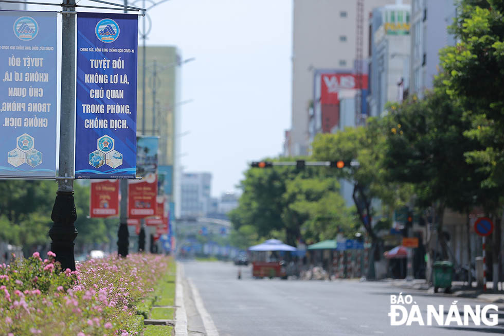 The normally bustling Nguyen Van Linh Street is deserted