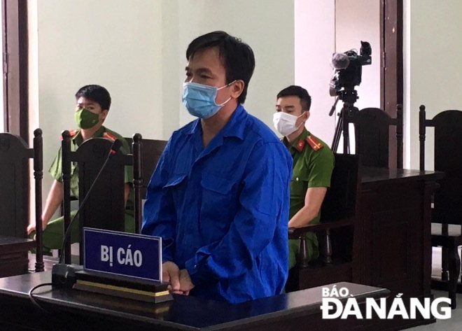 Bị cáo Lưu Văn Chiến tại phiên tòa sáng 31-8. Ảnh: L.H