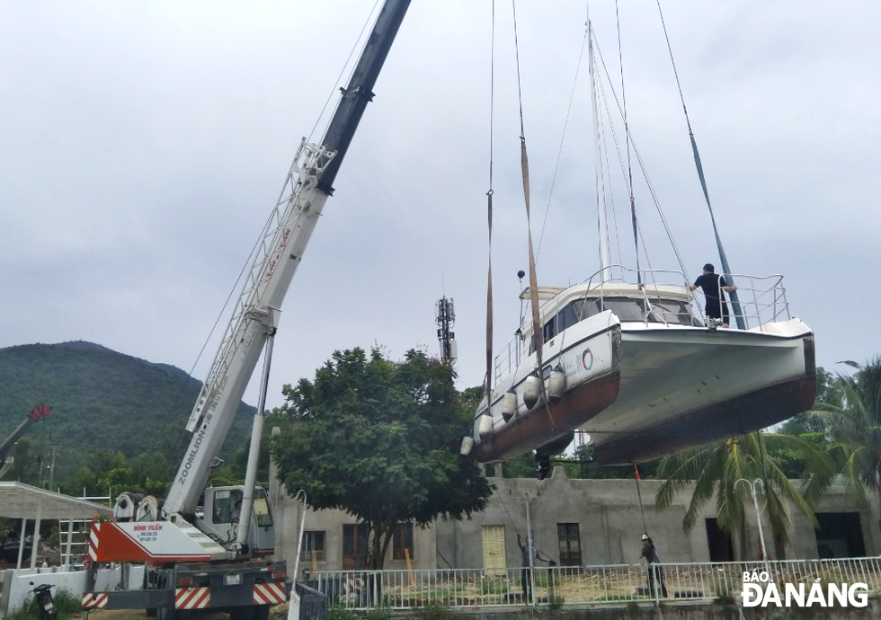 Cranes are used to pull the boats out of water