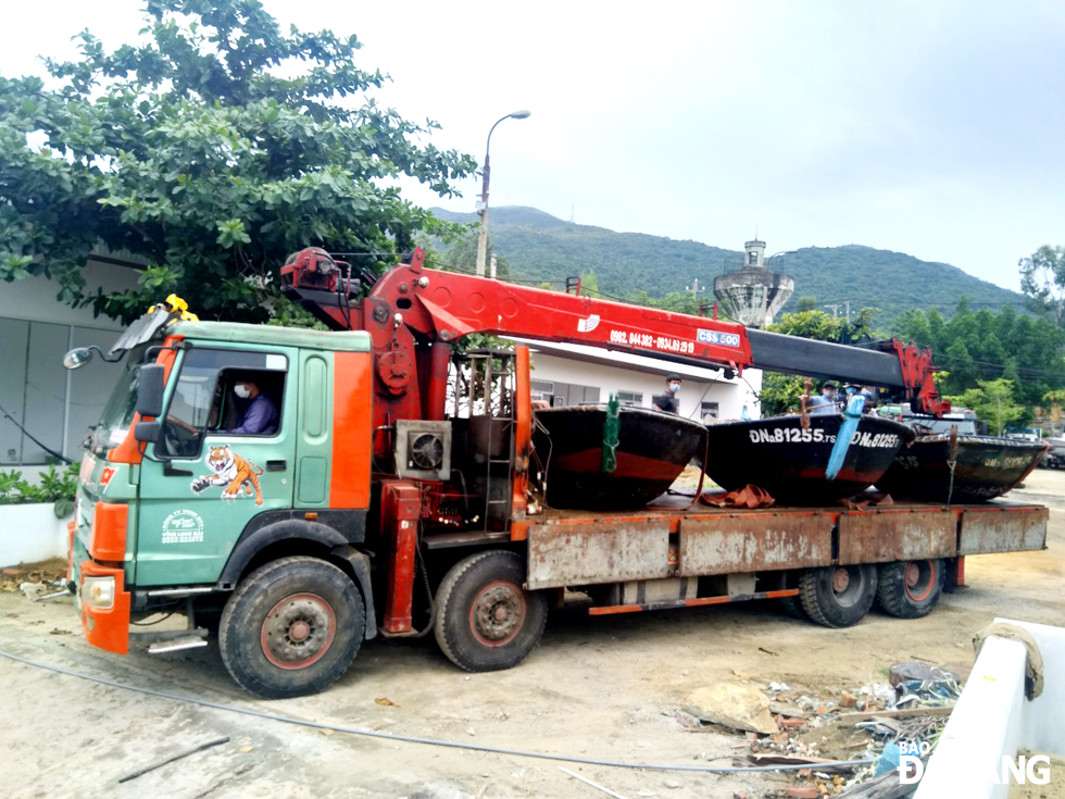 Truck will carry the boats to a safe place