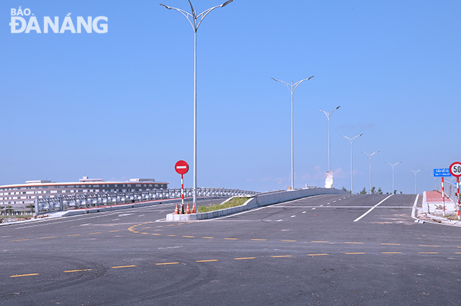 The new bridge over Co Co River has been already completed and is ready to open for traffic. Photo: THANH LAN