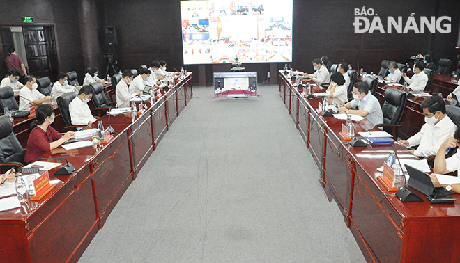 Da Nang’s delegates attend the online meeting. Photo: THANH LAN