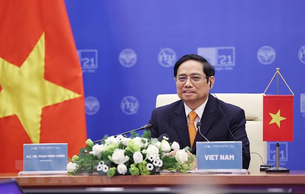Thủ tướng Phạm Minh Chính phát biểu tại Hội nghị Bộ trưởng ITU Digital World 2021. (Ảnh: Dương Giang/TTXVN)