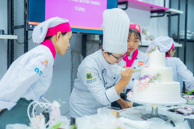 Apprentices not only learn knowledge but are also first trained in service attitude to be able to become professional workers in the future. (Photo courtesy by the Eurasian Vocational Training, taken before COVID-19 resurgence)