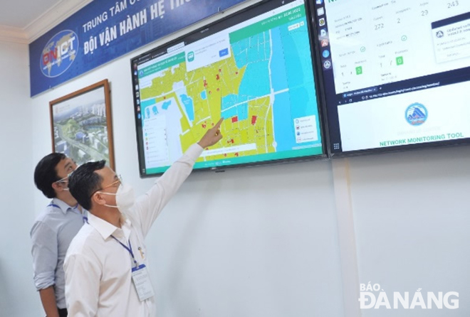 Staff at an e-government system infrastructure operation room at the Da Nang Information Technology and Communications Centre. Photo: TRIEU TUNG