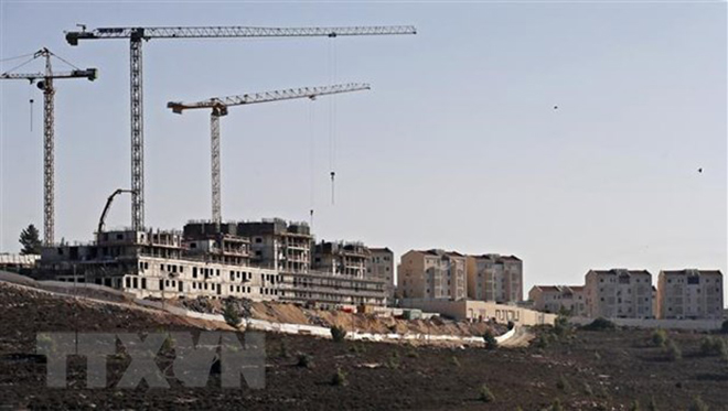 Công trình xây dựng một khu định cư của Israel tại thành phố Ramallah, Bờ Tây ngày 5-10. (Ảnh: AFP/TTXVN)