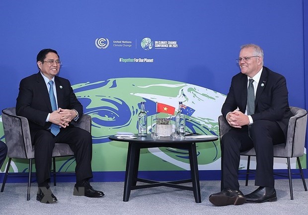 PM Pham Minh Chinh (left) meets with his Australian counterpart Scott Morrison. (Photo: VNA) 