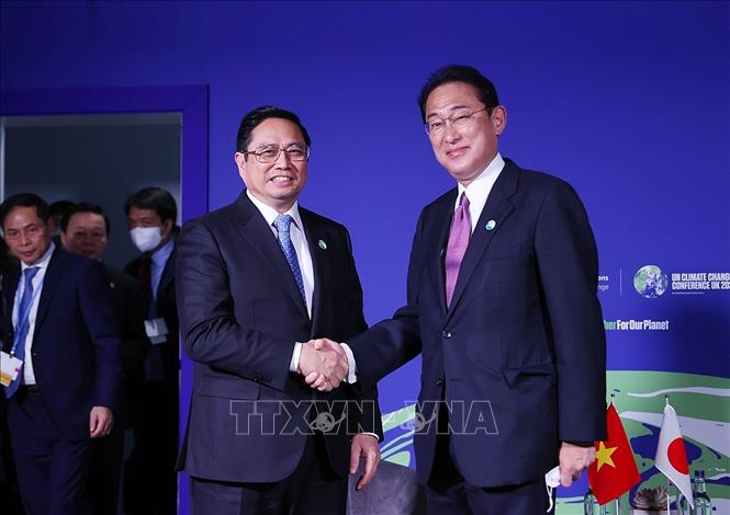 Thủ tướng Phạm Minh Chính gặp Thủ tướng Nhật Bản Kishida Fumio. Ảnh: Dương Giang/TTXVN