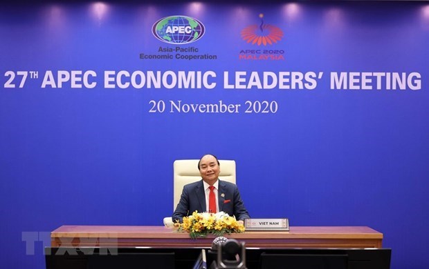 Then Prime Minister Nguyen Xuan Phuc attends the 27th APEC Economic Leaders’ Meeting via videoconference on November 20, 2020 (Photo: VNA)