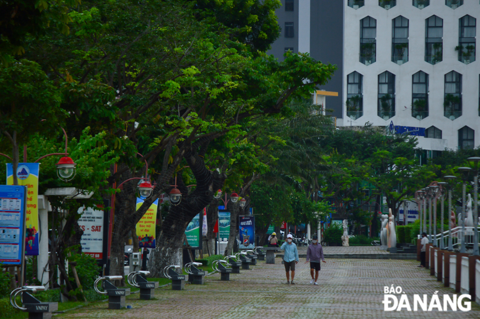 People doing physical exercises on Bach Dang Street.