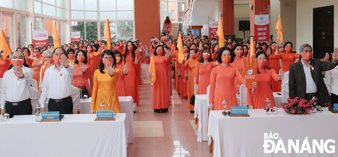 Delegates participated in the programme ‘Orange colour - Light up and go ahead’ to respond to the Action Month for Gender Equality and to prevent and respond to gender-based violence in 2021. Photo: P.V.