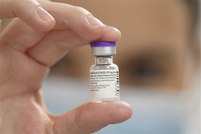 Vaccine phòng Covid-19 của hãng dược Pfizer-BioNTech. Ảnh: AFP/ TTXVN