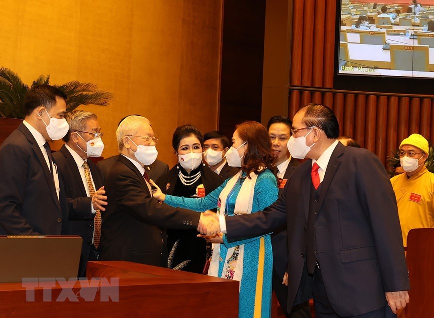 Tổng Bí thư Nguyễn Phú Trọng và nguyên Tổng Bí thư Nông Đức Mạnh cùng các đại biểu dự hội nghị. (Ảnh: Trí Dũng/TTXVN)