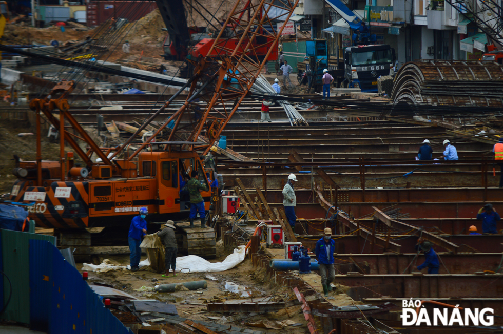 Dozens of construction workers are busy welding and knitting steel for the tunnel