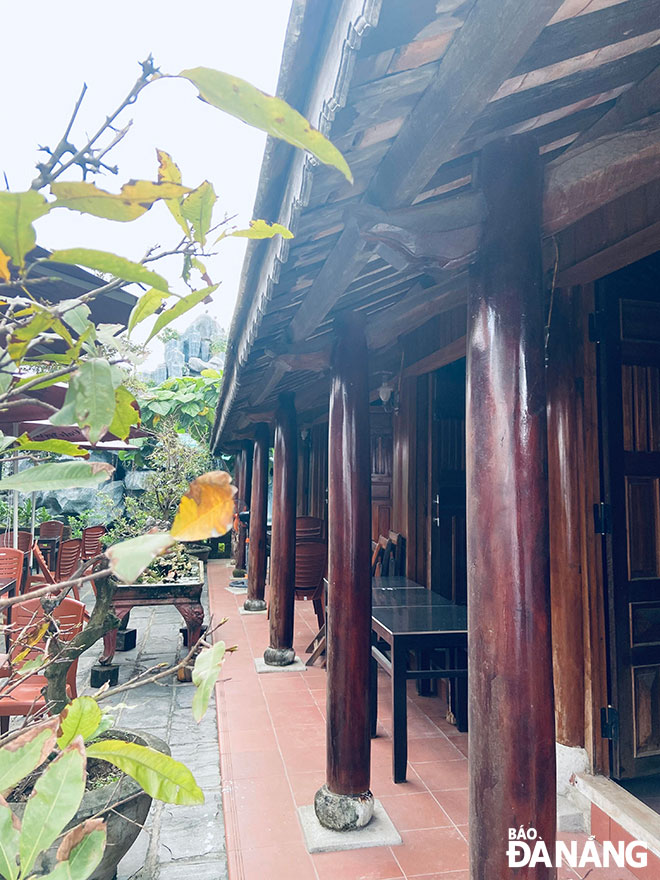 The 3-compartment and 2-wing house was built from 36 jackfruit trees for the purpose of restoring Vietnamese families' cultural space. Photo: TIEU YEN