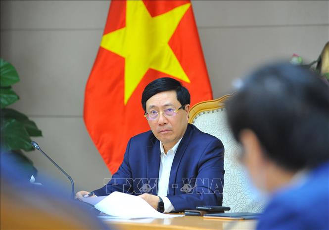 Phó Thủ tướng Thường trực Chính phủ Phạm Bình Minh chủ trì cuộc họp. Ảnh: Minh Đức/TTXVN