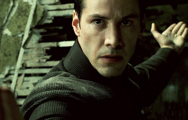 Diễn viên Keanu Reeves thủ vai hacker Neo trong phim “Ma trận: Hồi sinh”.  Ảnh: The Guardian