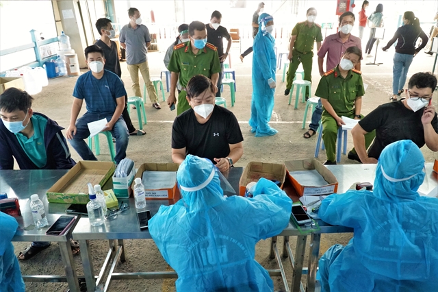 A vaccination site offering third COVID-19 vaccine doses for frontline workers at Gò Vấp District, HCM City, on December 10, 2021. HCM City was the first in the country to start giving booster shots. — VNA/VNS Photo Thu Hương