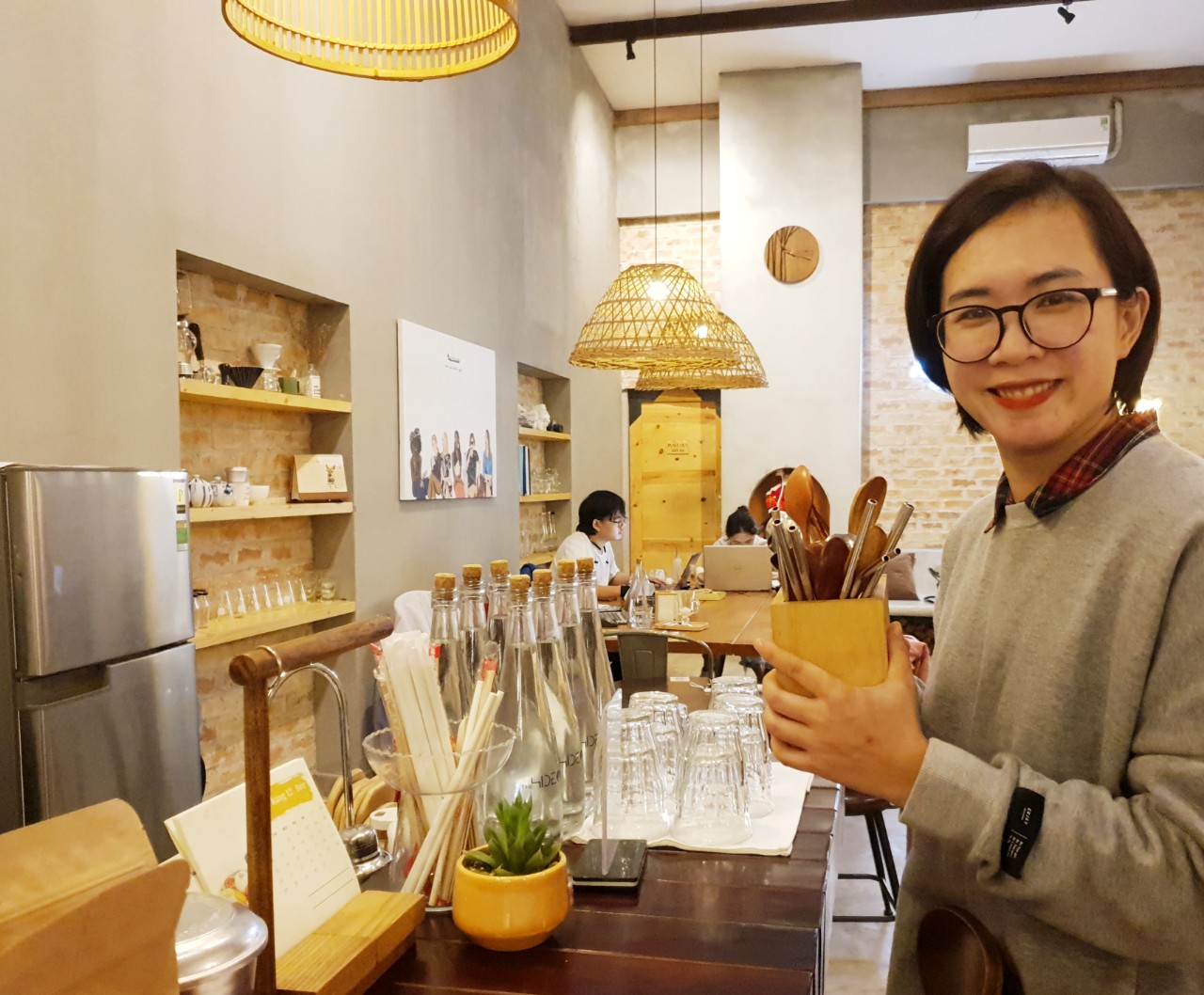 Nguyen Thi Ha Phuong, the owner of The Hideout café, is spreading a lifestyle of reducing plastic waste to the community. Photo: DAN TAM