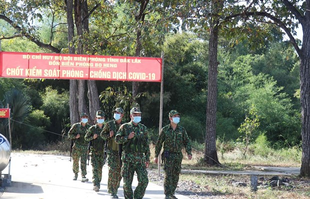 Các chiến sỹ Đồn Biên phòng Bo Heng tuần tra, kiểm soát khu vực biên giới. (Ảnh: Tuấn Anh/TTXVN)