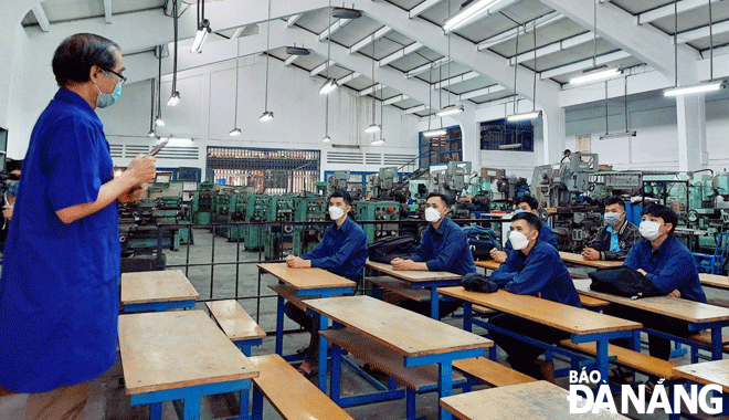 Students from the University of Educational Technology are attending face-to-face classes. Photo: NGOC HA