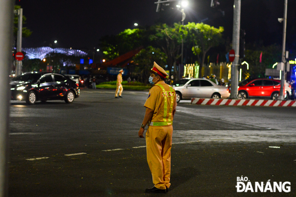 Traffic police officers on duty on roads to ensure traffic order and safety. 