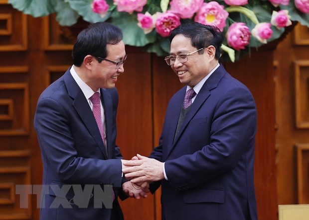 Thủ tướng Phạm Minh Chính tiếp ông Choi Joo Ho, Tổng Giám đốc Tổ hợp Samsung Việt Nam. (Ảnh: Dương Giang/TTXVN)
