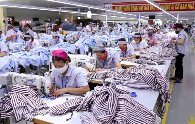 Garment products are made by workers of South-Korean KH Vina Co in the central province of Thanh Hoá. — VNA/VNS Photo Vũ Sinh