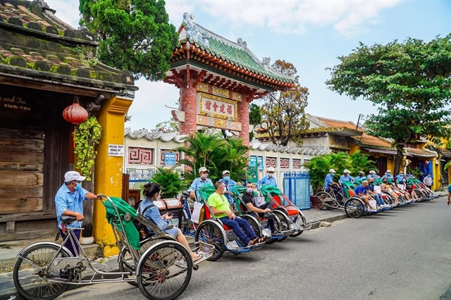 Tourists on cyclo tours in Hoi An ancient town, Quang Nam Province. — Photo courtesy of the Viet Nam National Administration for Tourism