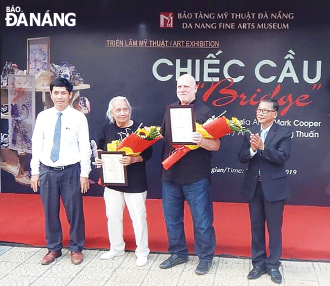 Artist Mark Cooper (second right) at the opening ceremony of the ‘Bridge’ exhibition.