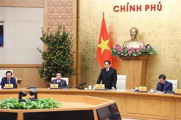 Prime Minister Pham Minh Chinh speaks at the meeting. (Photo: VNA)