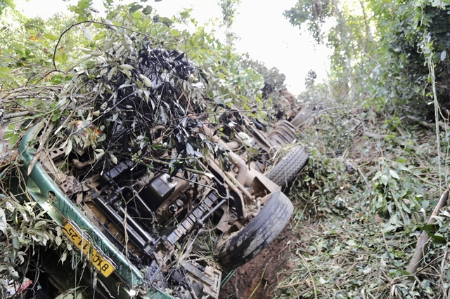 The truck is seen after plunging off a mountain cliff in Đak Đoa District of the Central Highlands province of Gia Lai on Wednesday morning, killing six and injuring three. —VNA/VNS Photo