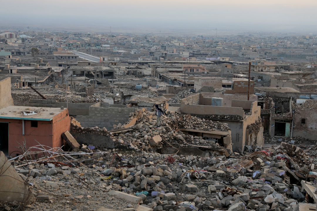 Những ngôi nhà bị phá hủy trong làn sóng tấn công của tổ chức Nhà nước Hồi giáo (IS) tự xưng ở thị trấn Sinjar thuộc Iraq ngày 24-1-2022. Ảnh: Reuters