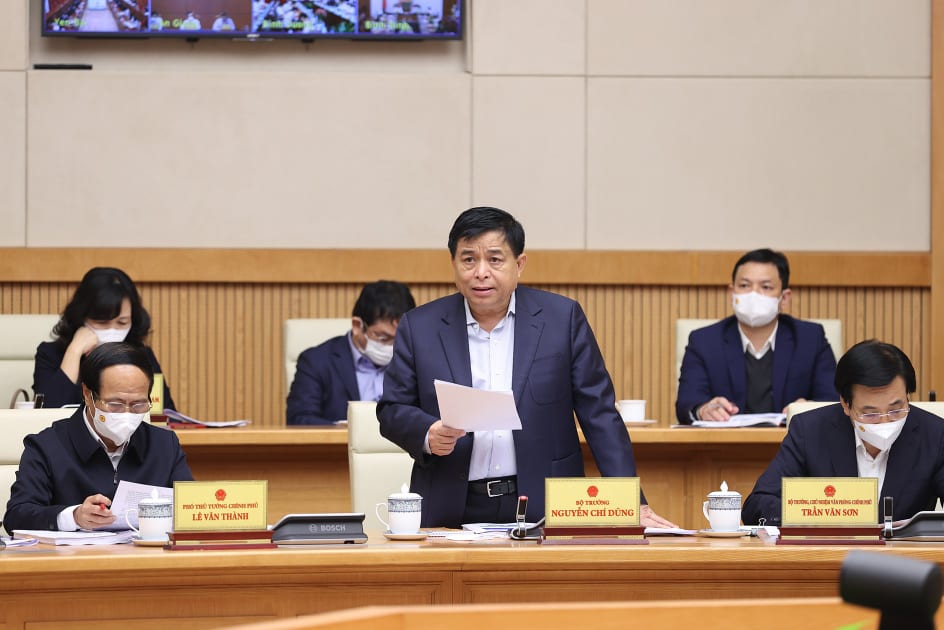 Bộ trưởng Bộ Kế hoạch và đầu tư Nguyễn Chí Dũng báo cáo tại Hội nghị. Ảnh: Dương Giang/TTXVN
